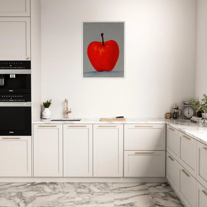 A vivid red apple stands alone against a muted gray backdrop, its glowing form balancing simplicity, boldness, and quiet elegance.