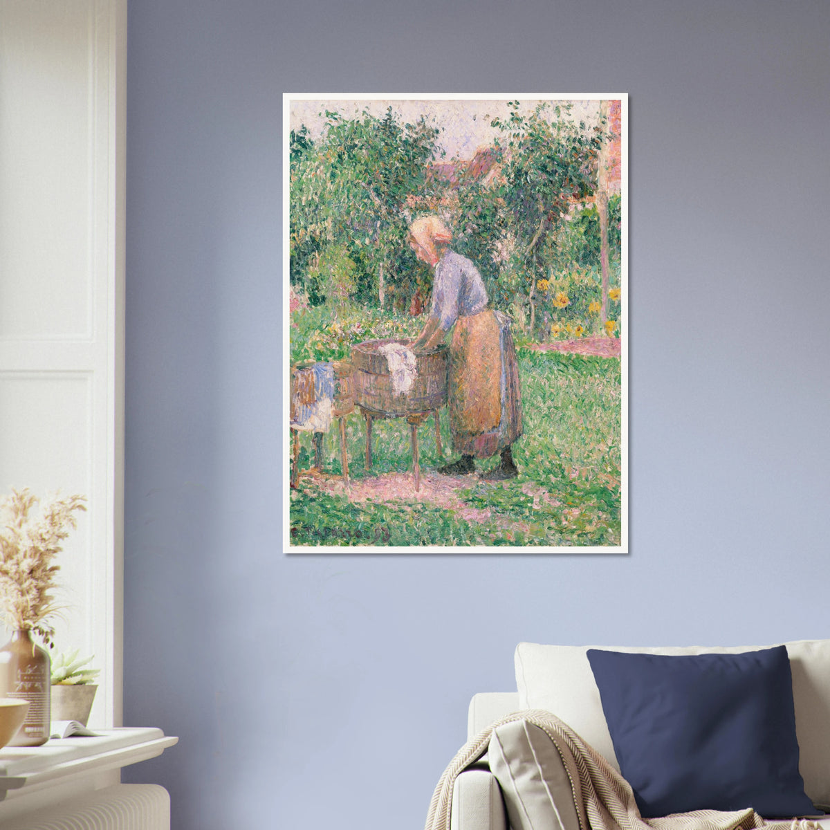A Pointillist painting of a washerwoman hard at work, scrubbing linens and clothing in one barrel and rinsing them in another. 