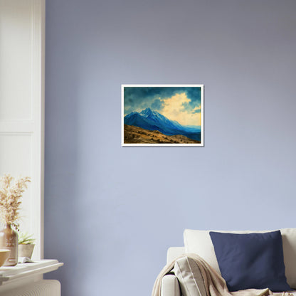 Majestic blue mountain peaks rise above golden rolling plains beneath luminous clouds, blending grandeur, distance, and tranquil wilderness.