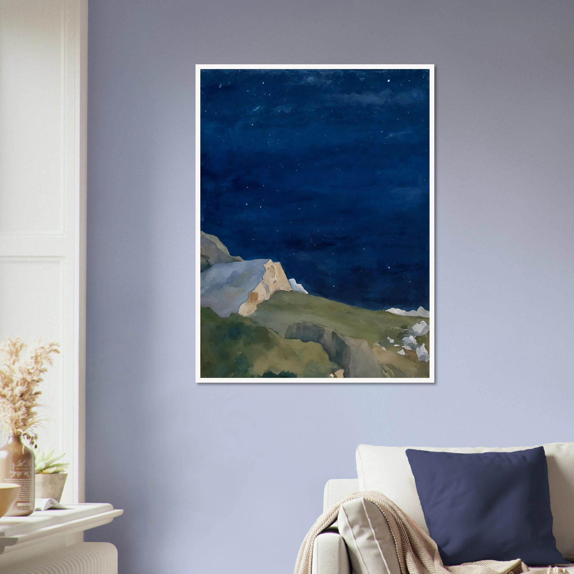 A tranquil night scene of rocky cliffs under a starlit indigo sky, evoking solitude and quiet wonder.