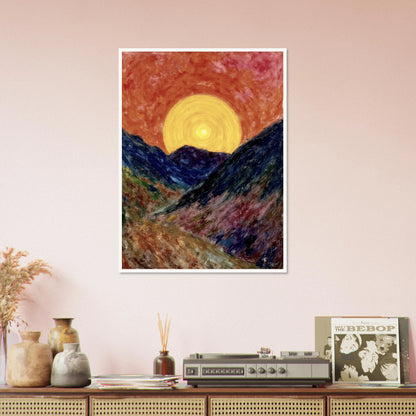 A vivid sunset over deep blue mountains with a glowing golden sun radiating warmth across the textured, colorful valley.