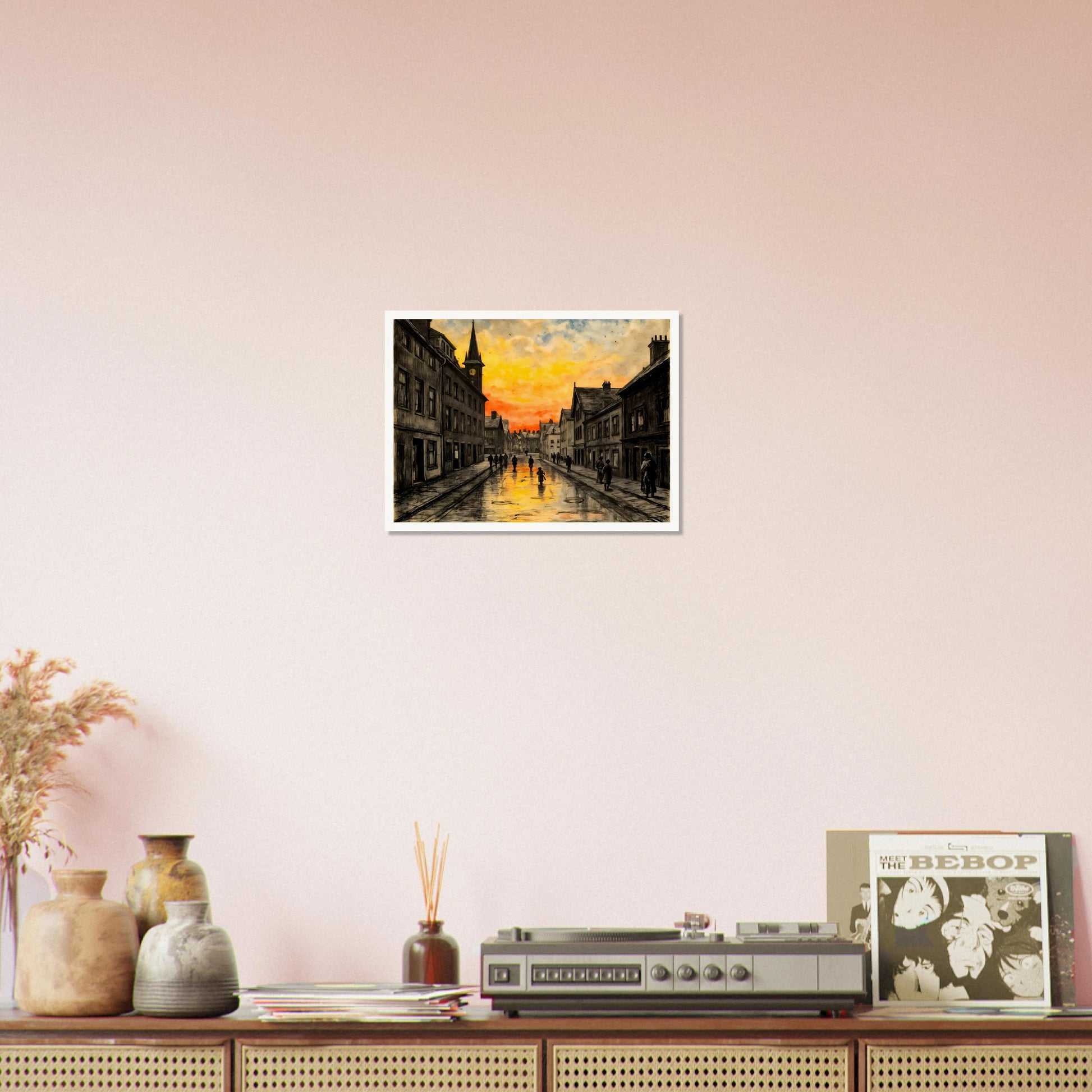 A vintage town street glows beneath a fiery sunset, with wet cobblestones reflecting amber skies and quiet figures walking home.