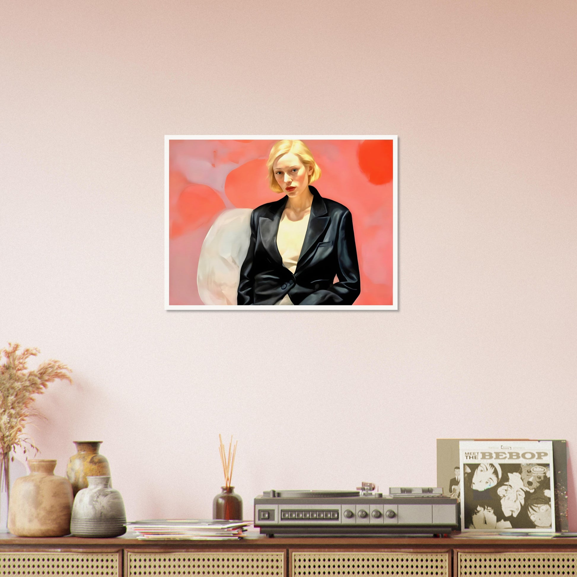 A striking portrait of a blonde woman in a black leather blazer, seated against a vibrant pink and red abstract background, exuding confidence and poise.