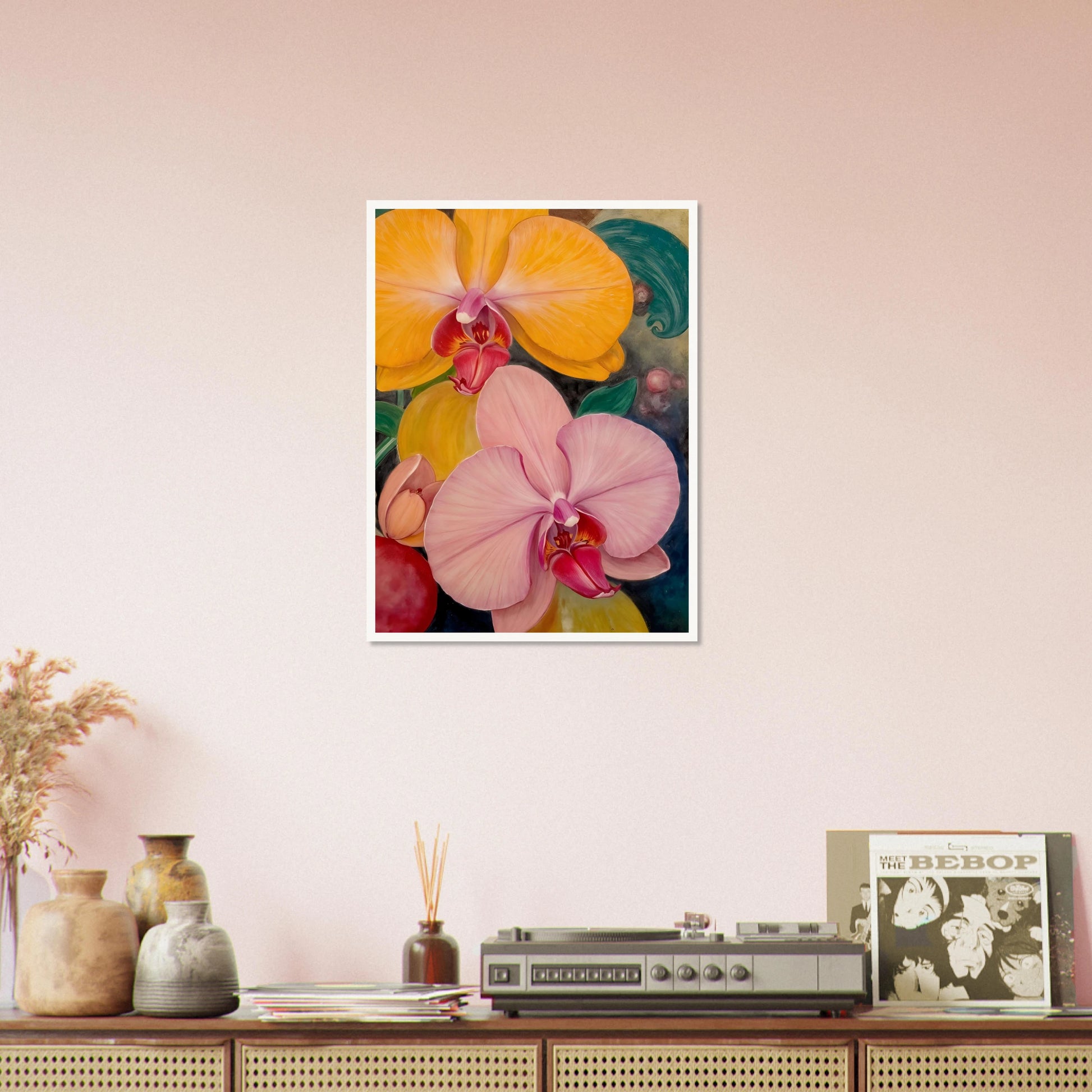 A vibrant floral painting featuring large blooming orchids in shades of golden yellow and soft blush pink, with rich magenta centers set against a dark, decorative background with lush green accents.