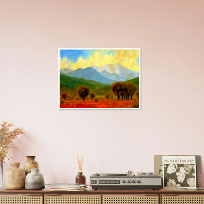 Warm autumn trees stretch across a fiery red field with misty blue mountains and a glowing yellow sky in the distance.