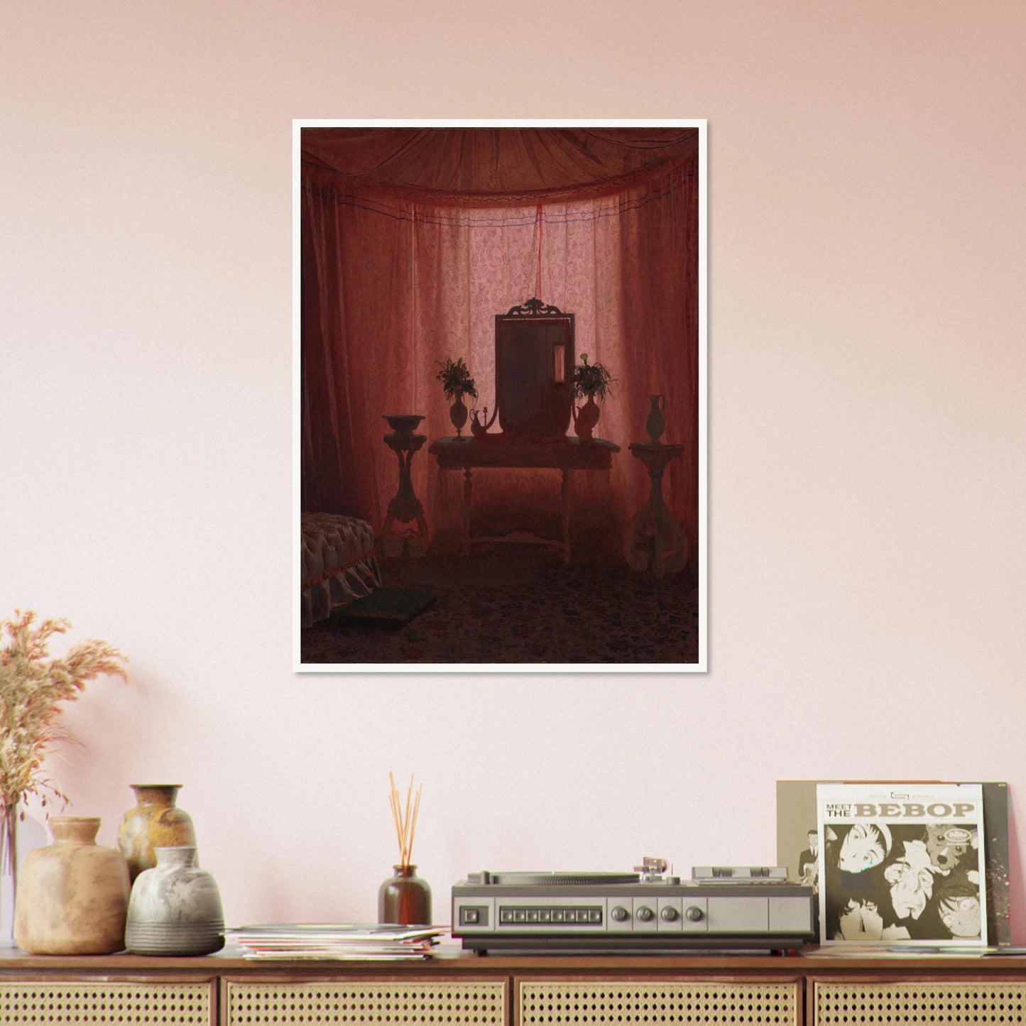 A softly lit bedroom glows through pink drapery, framing a mirror, flower vases, elegant furniture, and part of a bed.