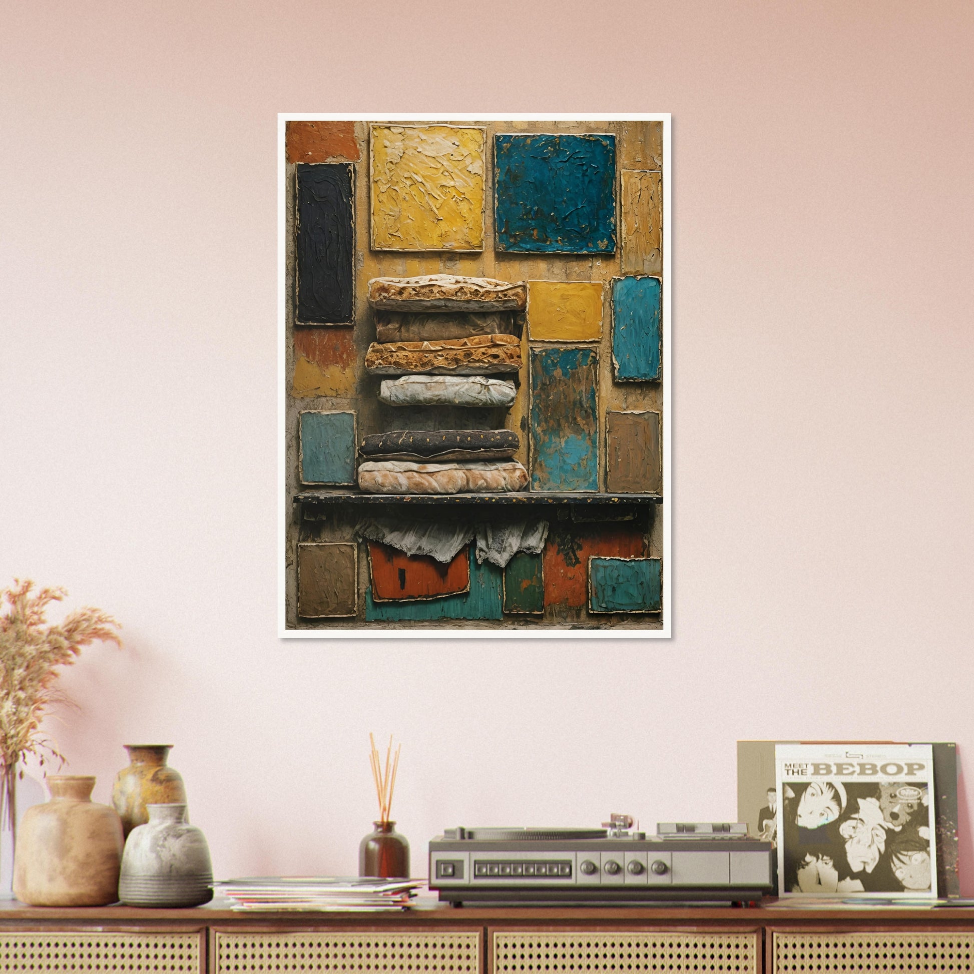 A rustic mixed-media artwork with layered textiles and textured blocks of yellow, blue, and earthy tones, evoking history and craftsmanship.