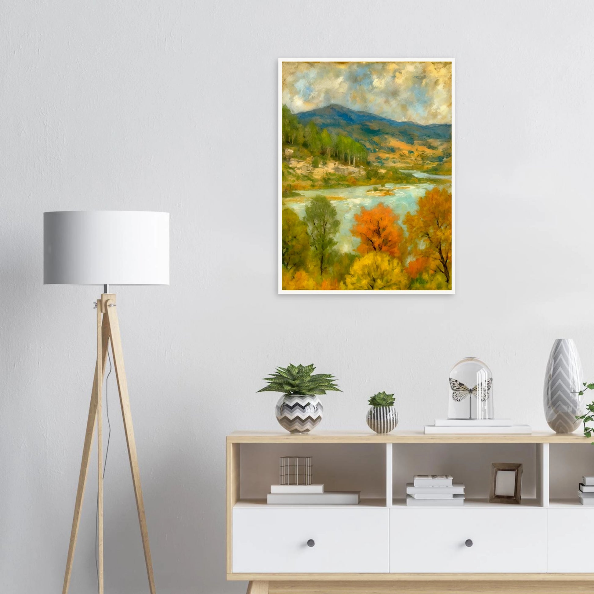 A serene river winds through a lush valley with colorful autumn trees and distant blue-green mountains.