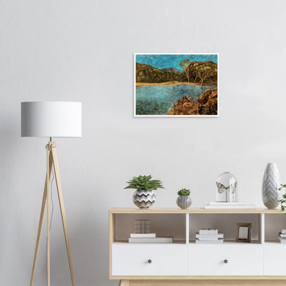 Blue lake with rocky shore, brown hills, slender trees, and turquoise sky in a quiet landscape.