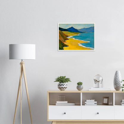 Golden shoreline curves beside turquoise water, green hills, and blue mountains under a pale sky.