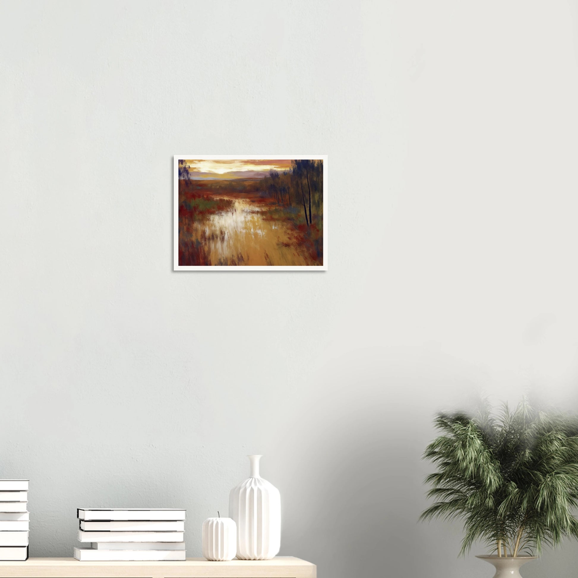 An atmospheric landscape painting depicting a calm marsh or river at sunset, with golden reflections on the water, autumn-toned grasses, and a line of slender trees beneath a glowing evening sky.