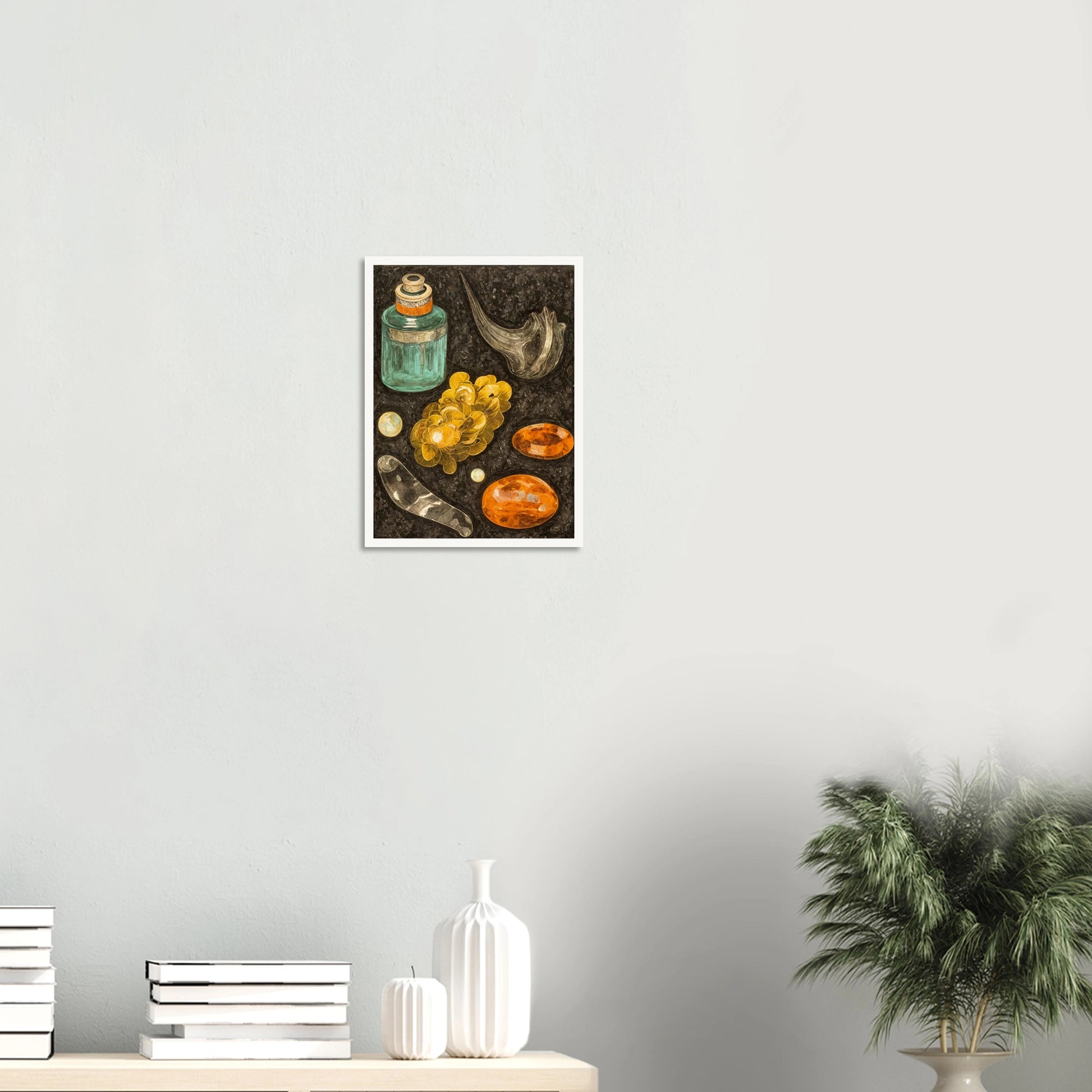 A collection of golden stones, glass objects, and a teal bottle arranged on a textured black background like hidden treasures.