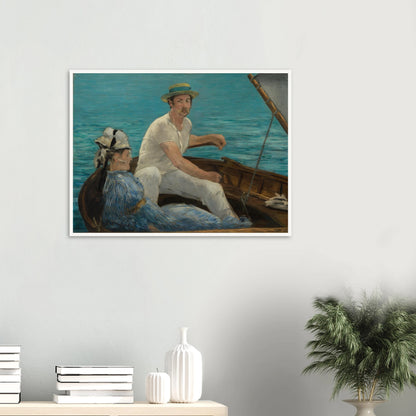 Man and woman sit in a small boat on bright blue water under a gray sail