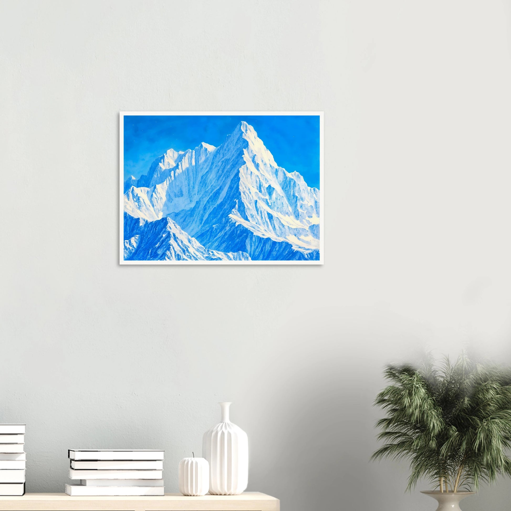 Towering icy mountain peaks glow in brilliant blues and whites beneath a crystal sky, evoking grandeur and stillness.