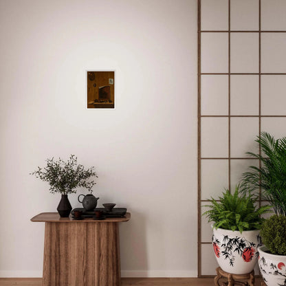 Artist palettes, brushes, prints, and a small painting hang on a wooden trompe l’oeil wall.