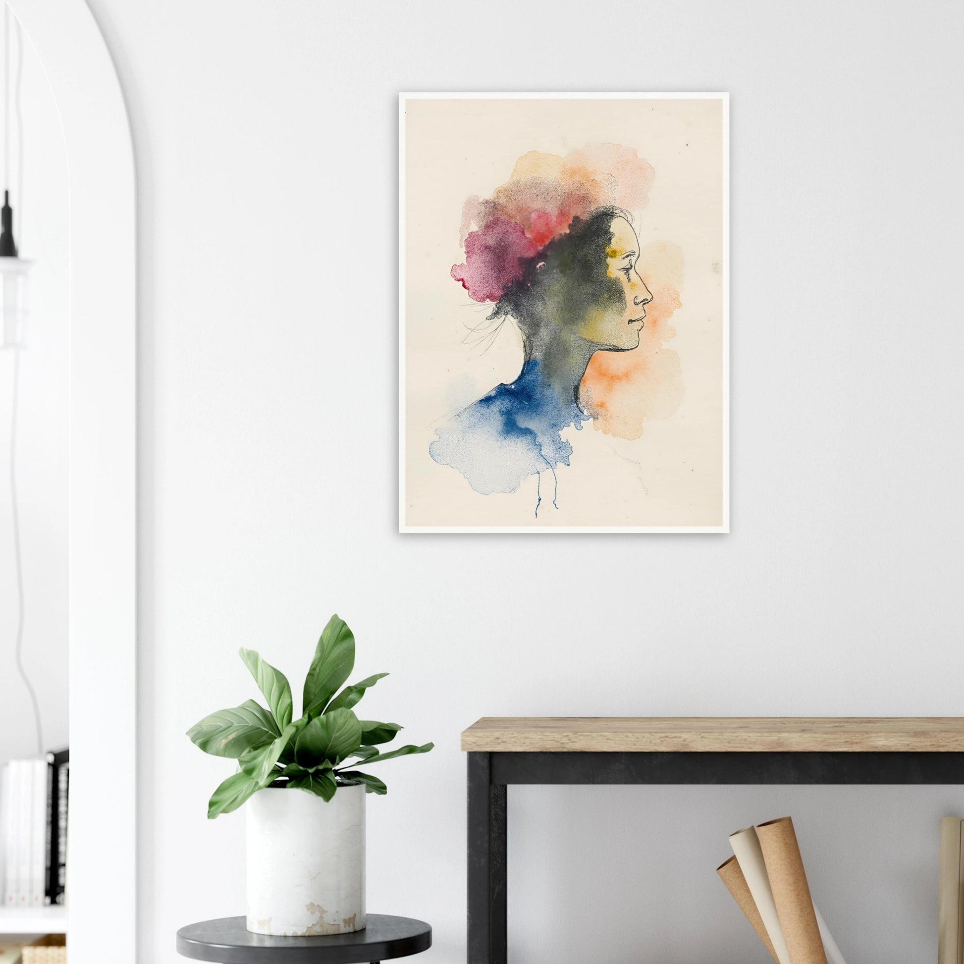Side profile of a woman formed by delicate watercolor clouds in blue, pink, and orange, merging softly on cream paper.