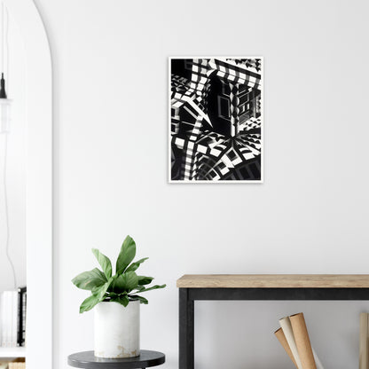 A striking black-and-white geometric composition with sharp angular patterns, distorted perspectives, and abstract architectural elements creating an optical illusion.