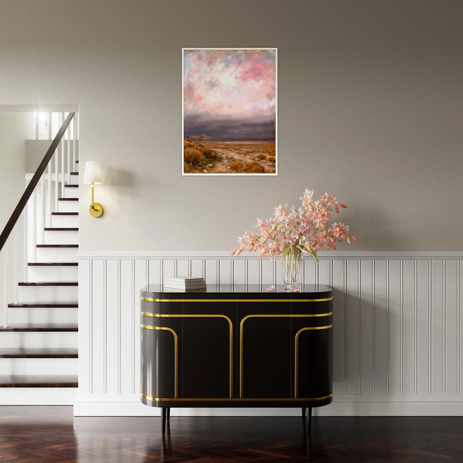 A dreamy desert landscape beneath soft pink and lavender clouds, with golden brush, distant hills, and a tranquil open horizon.