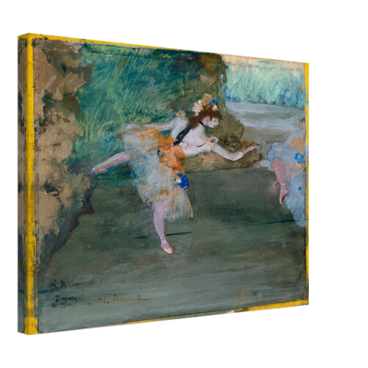 A ballet dancer in a pale tutu performs onstage, with another dancer partly visible at the side.
