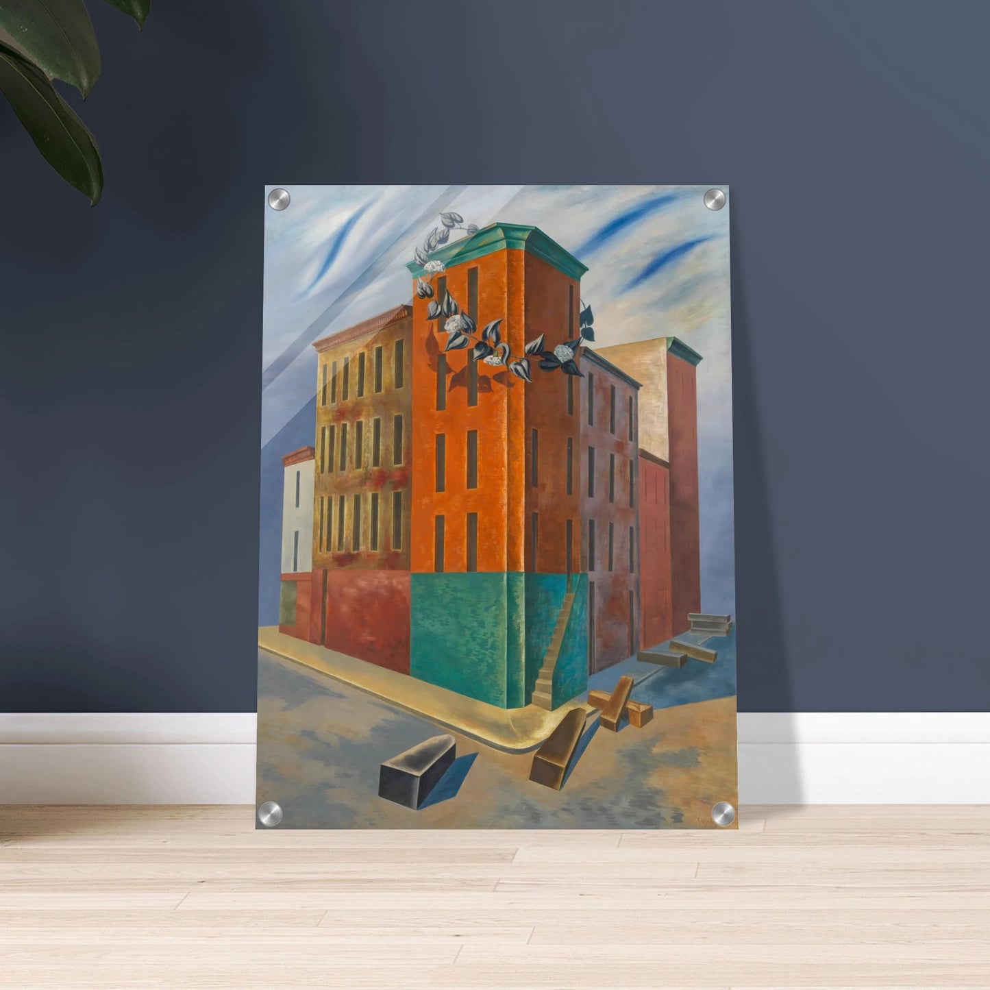 Colorful tenement buildings rise over an empty street with scattered blocks and a flowering vine beneath a blue sky.