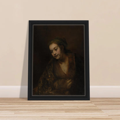 A softly lit woman looks downward while holding her robe against a dark brown background.