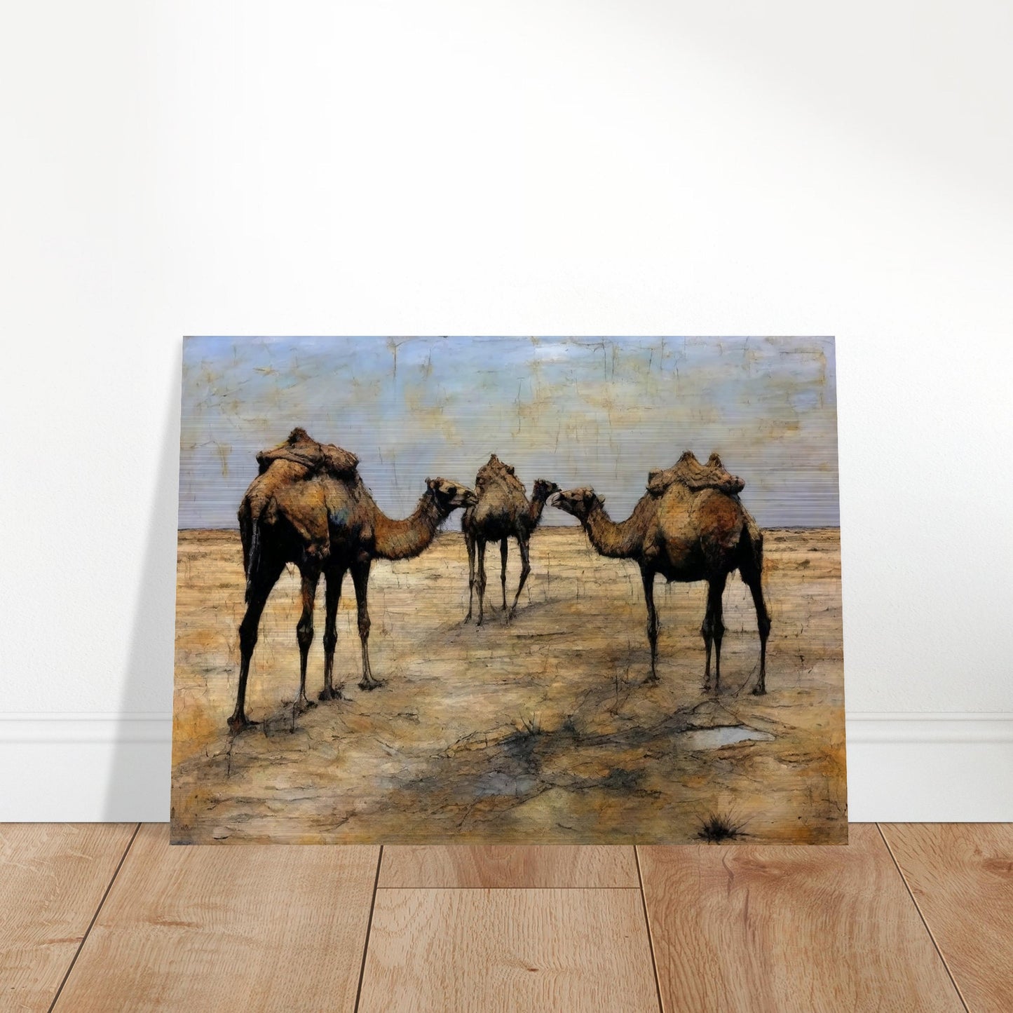 A detailed painting of three camels with packs standing together in a vast, arid desert landscape under a blue sky.