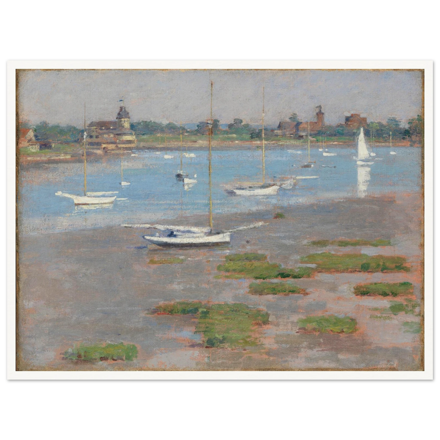 Sailboats rest at low tide near Riverside Yacht Club under hazy blue skies