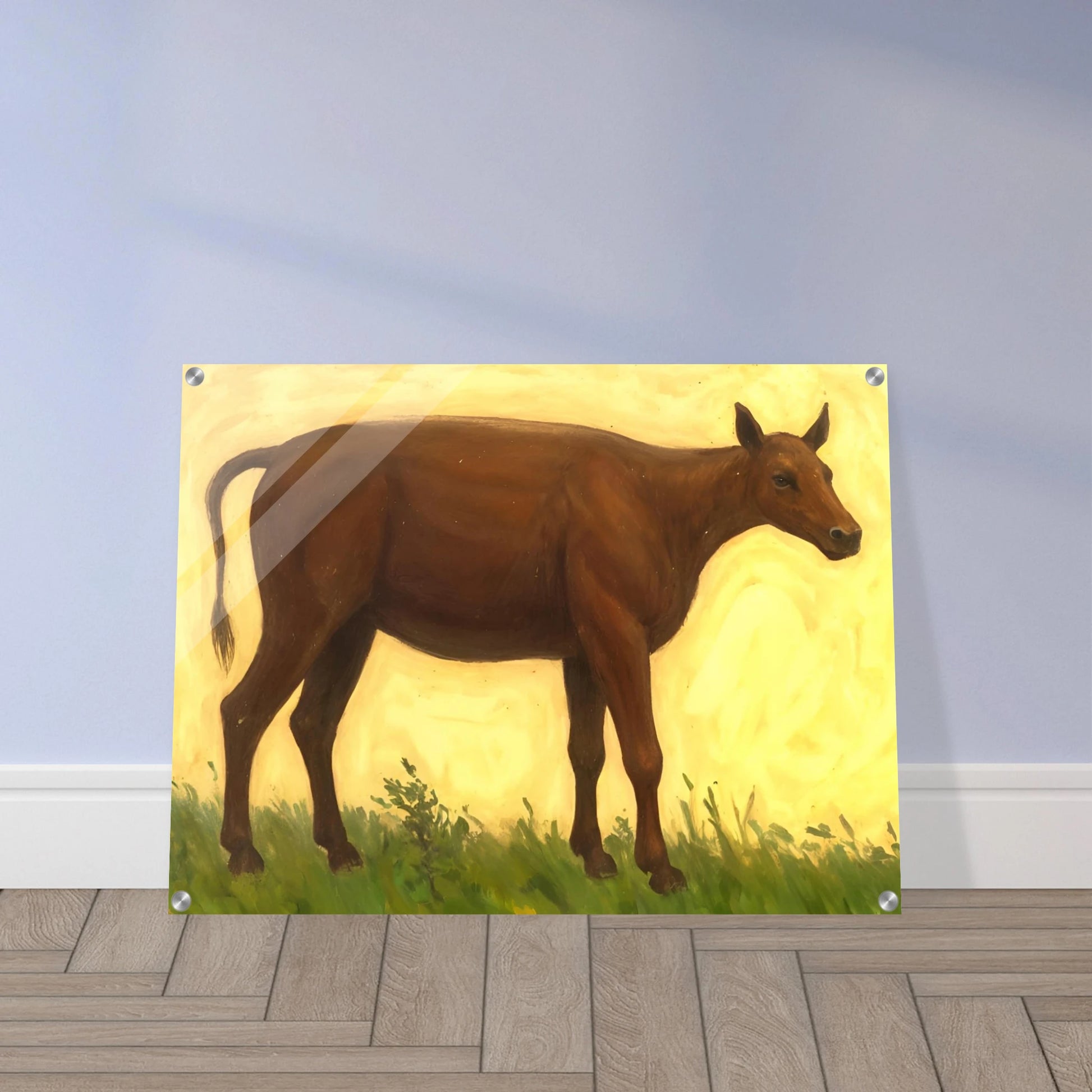 A brown cow standing on grassy pasture against a soft golden-yellow background, exuding calm and simplicity.