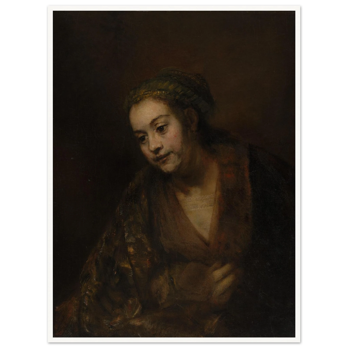 A softly lit woman looks downward while holding her robe against a dark brown background.