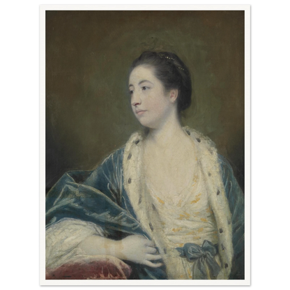 Young woman in a blue robe with fur trim poses against a dark green background