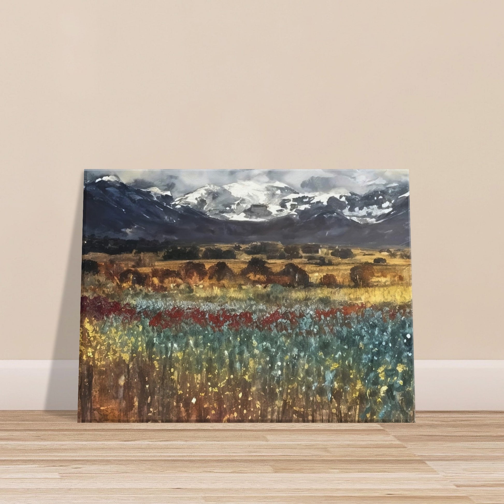 Expansive landscape with vibrant fields of flowers in red, yellow, and blue hues, framed by distant snow-capped mountains and a dramatic sky.