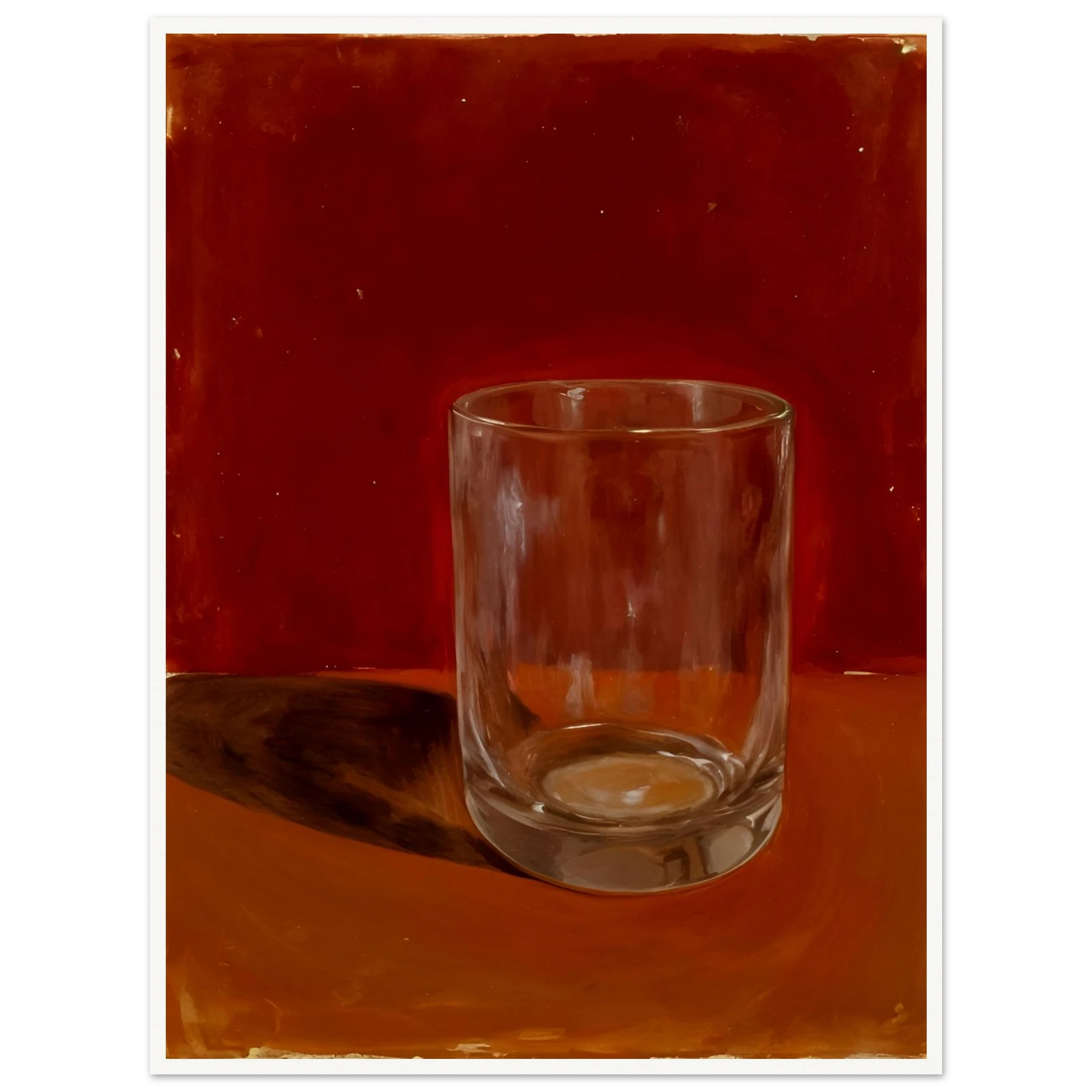 Transparent drinking glass casting a soft shadow on a warm orange and red background.
