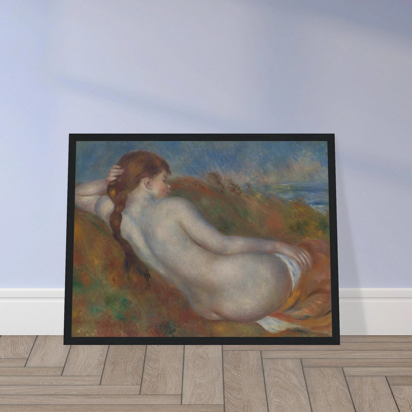 Reclining nude figure with braided hair rests in a soft landscape near the sea