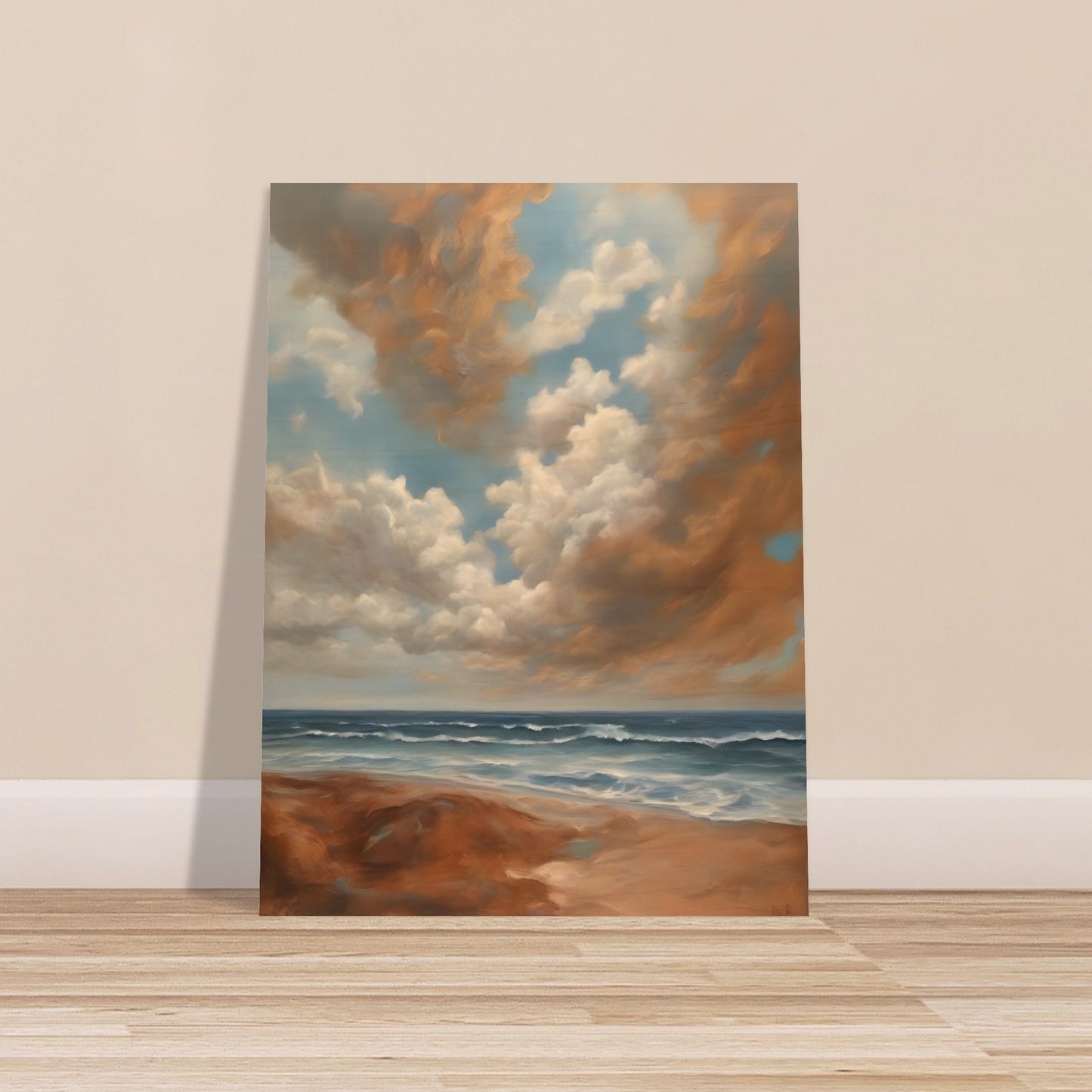 A breathtaking seascape with soft waves rolling onto a sandy shore beneath a sky filled with billowing golden clouds against a serene blue backdrop.