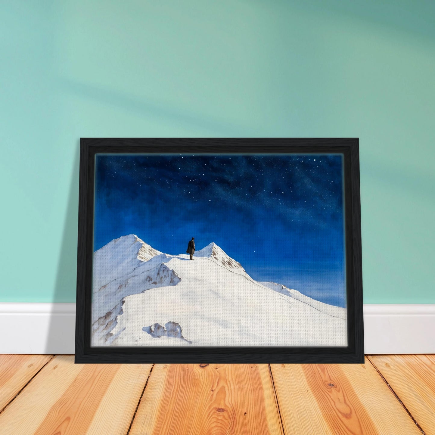 Solitary figure stands atop snowy mountain peaks beneath a vast starlit sky, evoking wonder, silence, and the grandeur of night.
