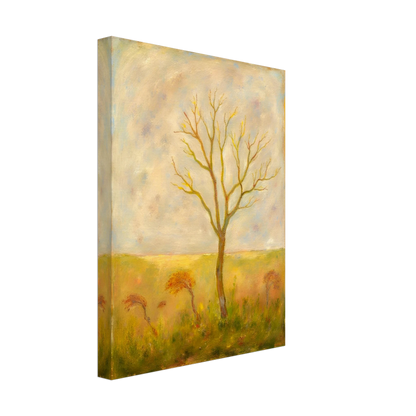 A lone tree stands tall in a golden meadow under a pale sky, its bare branches reaching gracefully toward the light.