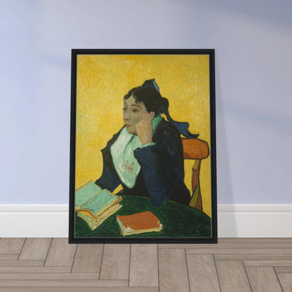 Woman in black and green sits at a table with open books against a vivid yellow background.