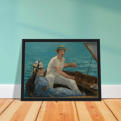 Man and woman sit in a small boat on bright blue water under a gray sail