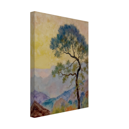 Delicate tree with green-blue foliage standing before pastel mountains under a soft yellow dawn sky.