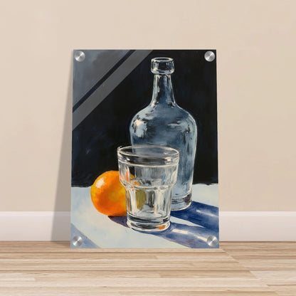 A clear glass, bottle, and orange sit on a sunlit surface, casting soft shadows against a dark background.