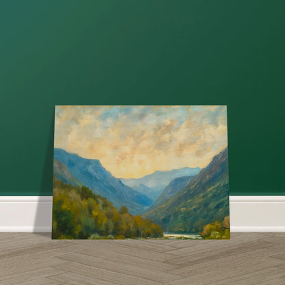 Peaceful mountain valley scene with layered blue ridges, autumn foliage, and a cloudy golden sky.