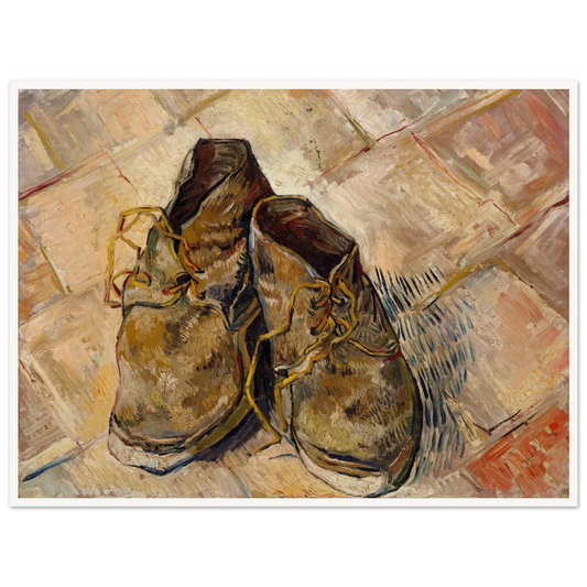 A pair of worn brown shoes with yellow laces rests on a pale tiled floor.