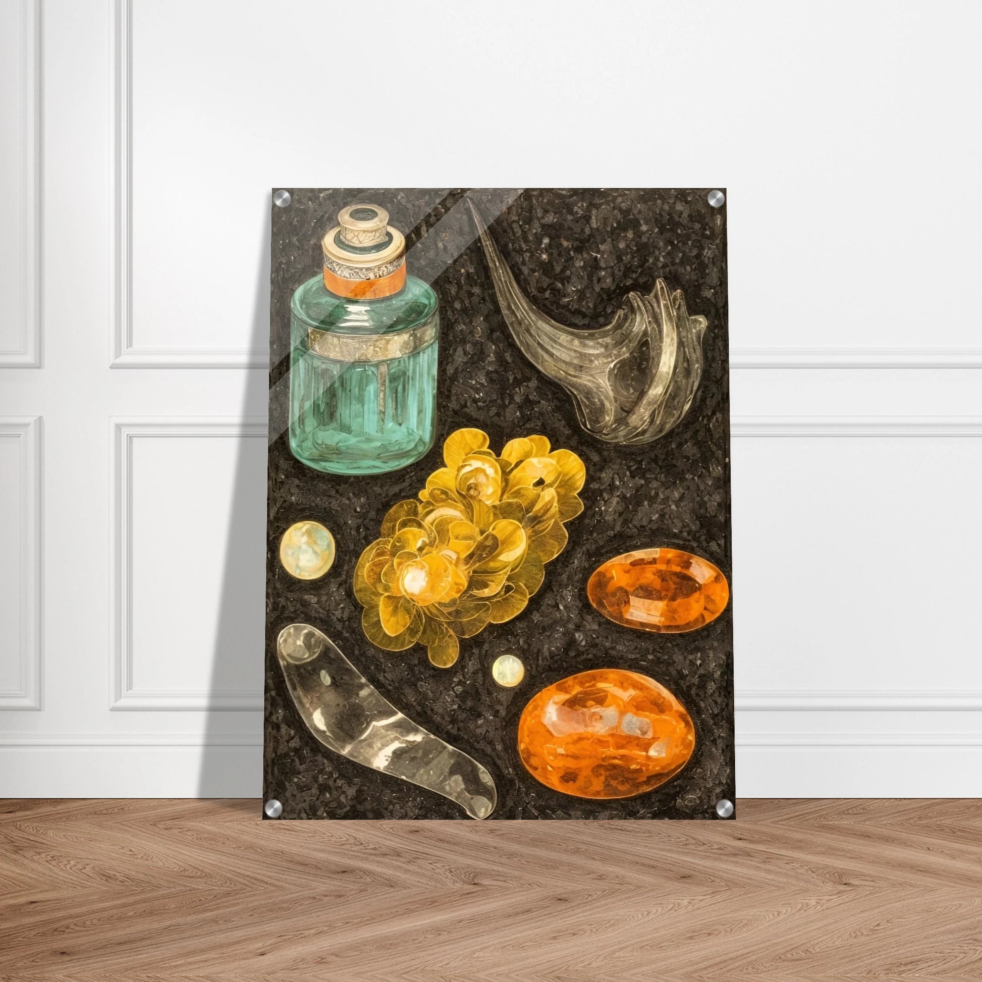 A collection of golden stones, glass objects, and a teal bottle arranged on a textured black background like hidden treasures.