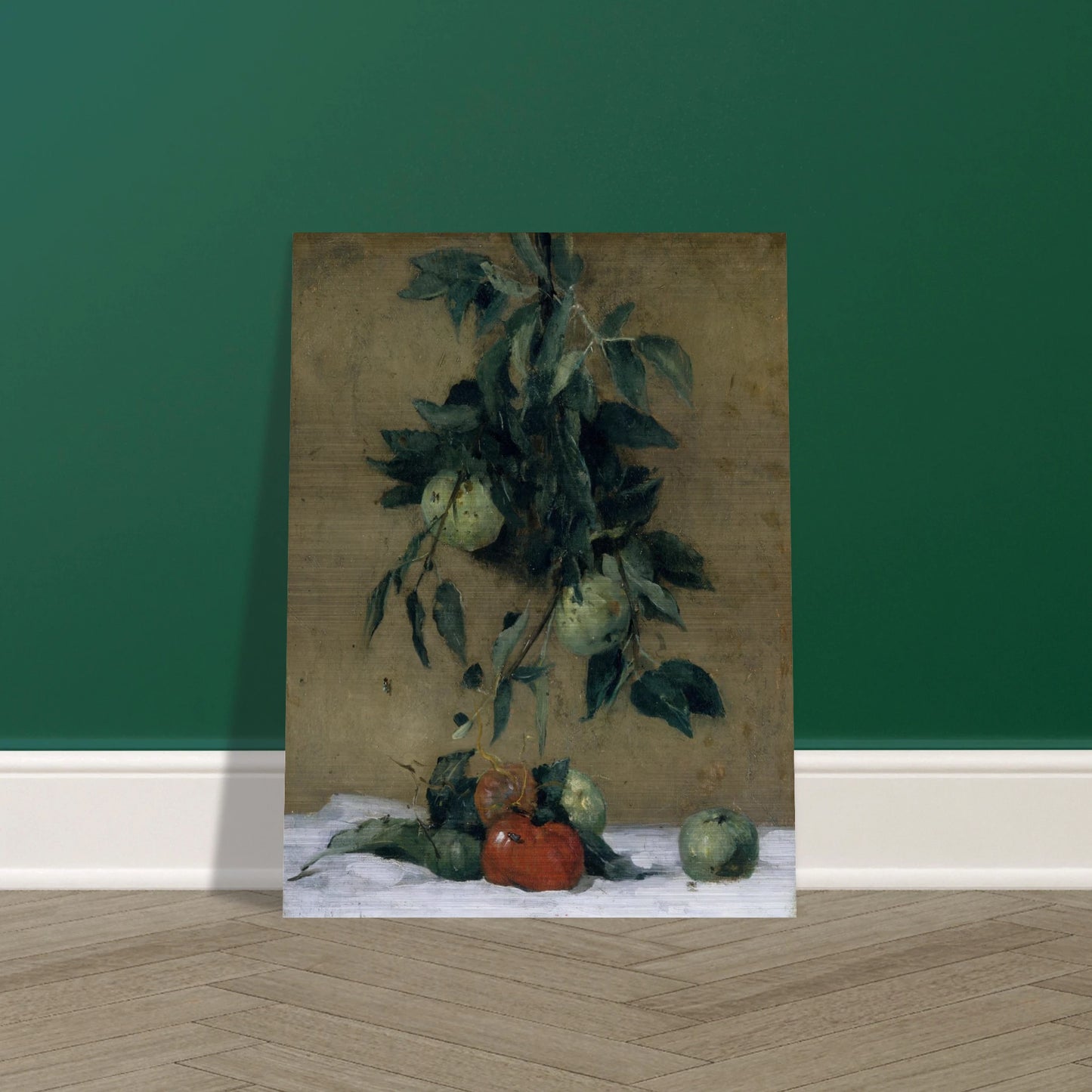Apples and leaves hang above red fruit on a white cloth in a muted still life
