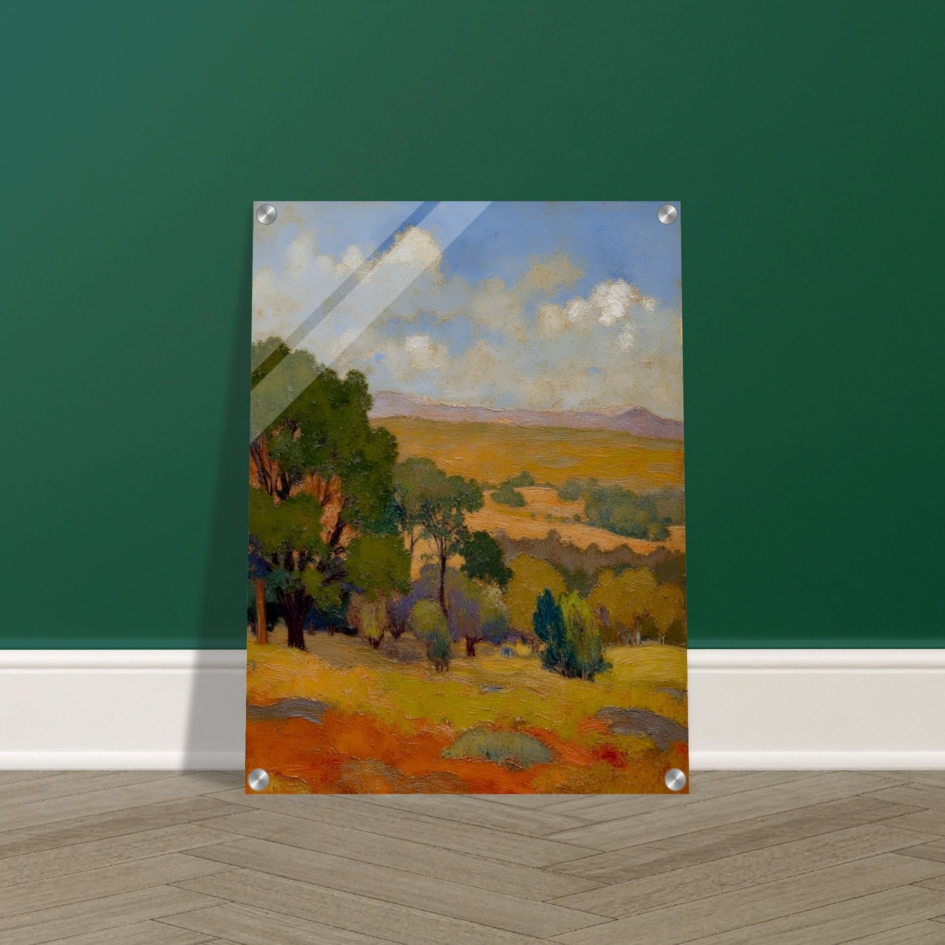 Golden fields and green trees stretch beneath a blue sky with soft clouds and distant hills.