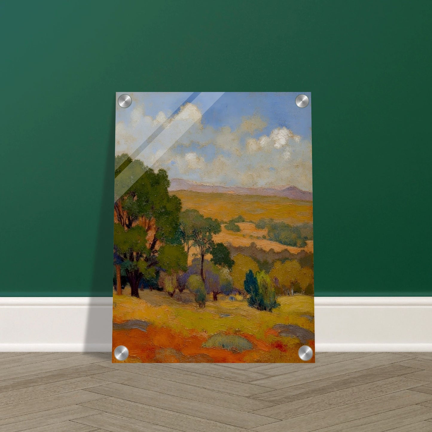 Golden fields and green trees stretch beneath a blue sky with soft clouds and distant hills.