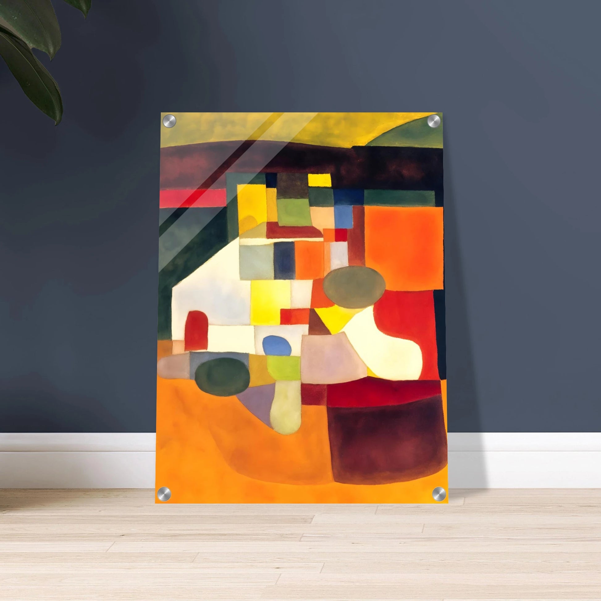 A cubist-inspired artwork of bold orange, yellow, and green shapes forming an abstract landscape of color and form.
