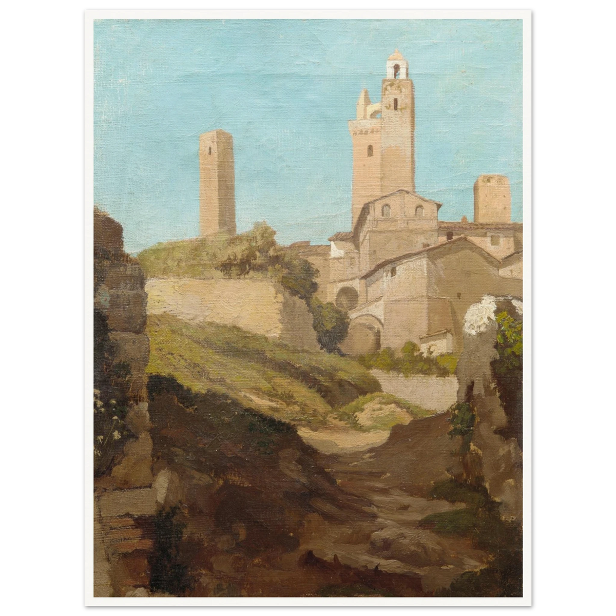 Medieval towers rise above San Gimignano’s sunlit hill town and rough path under a pale blue sky.