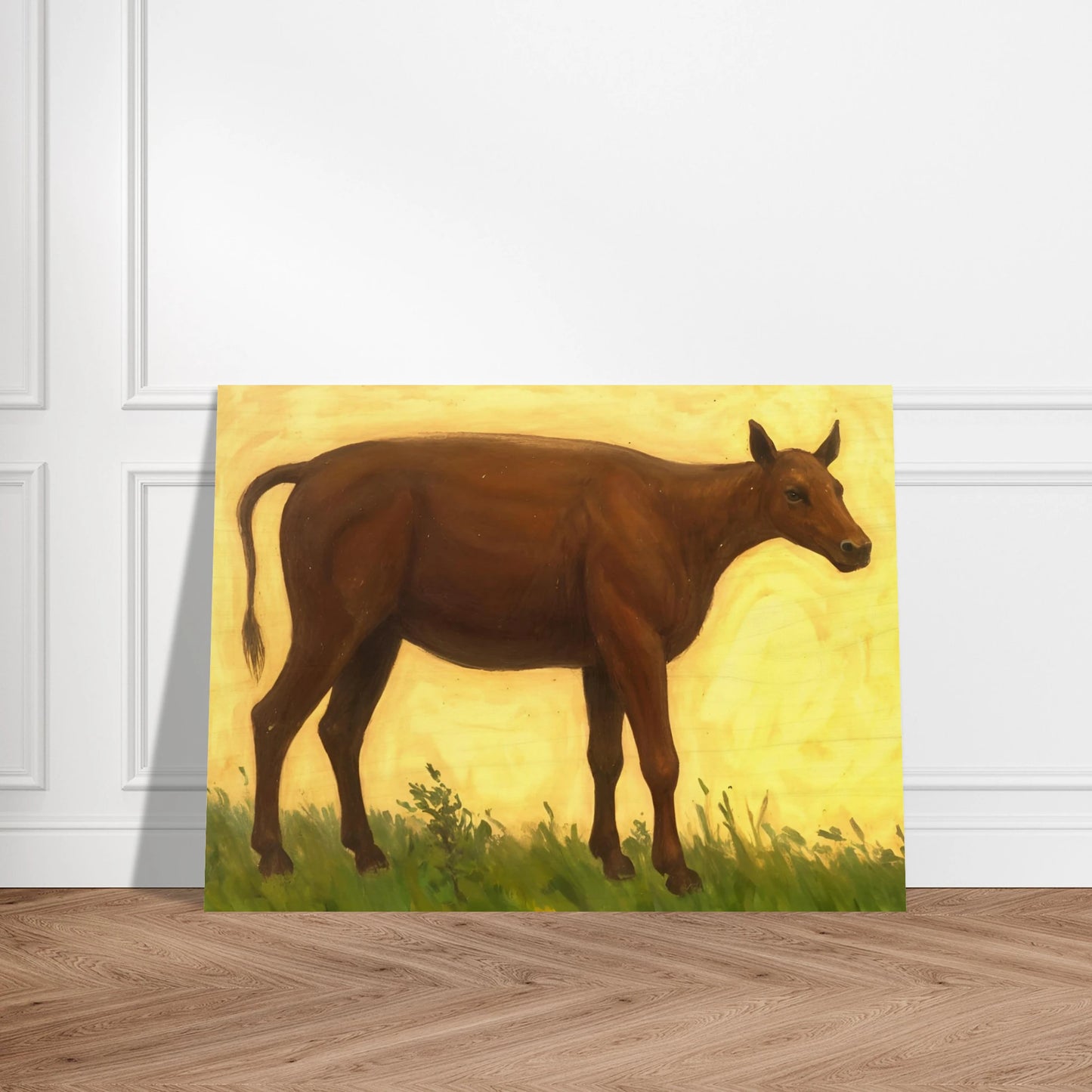 A brown cow standing on grassy pasture against a soft golden-yellow background, exuding calm and simplicity.