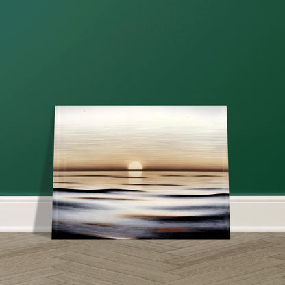 A minimalist seascape capturing the calm of sunrise, where golden light reflects softly on gentle ocean waves.